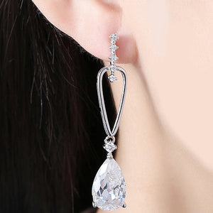 14K White Gold Plating Dangling White Swarovski Pear Cut Earrings