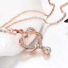 Load image into Gallery viewer, Intertwined Duo Hearts Swarovski Elements Necklace in 14K Gold
